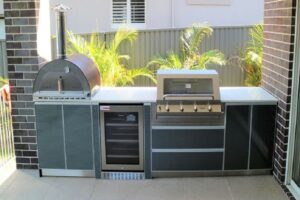 modular outdoor kitchen with a pizza oven,