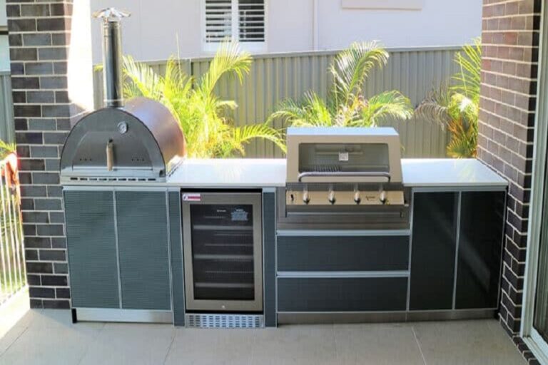 modular outdoor kitchen with a pizza oven,